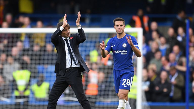 LONDON, ENGLAND - OCTOBER 21:  Cesar Azpilicueta of Chelsea and Antonio Conte, Manager of Chelsea clap the fans after the Premier League match between Chel