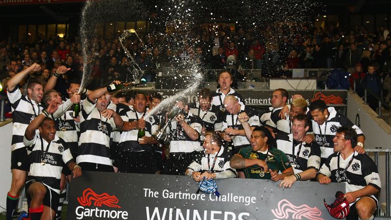 LONDON - DECEMBER 01:  The Barbarians players celebrate their victory with the trophy during the Gartmore Challenge match between the Barbarians and South 