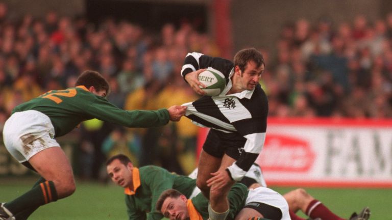 3 DEC 1994:  PHILIPPE SAINT-ANDRE OF THE BARBARIANS IS HELD BACK BY JAPIE MULDER OF SOUTH AFRICA DURING THE MATCH AT LANSDOWNE ROAD IN DUBLIN. SOUTH AFRICA