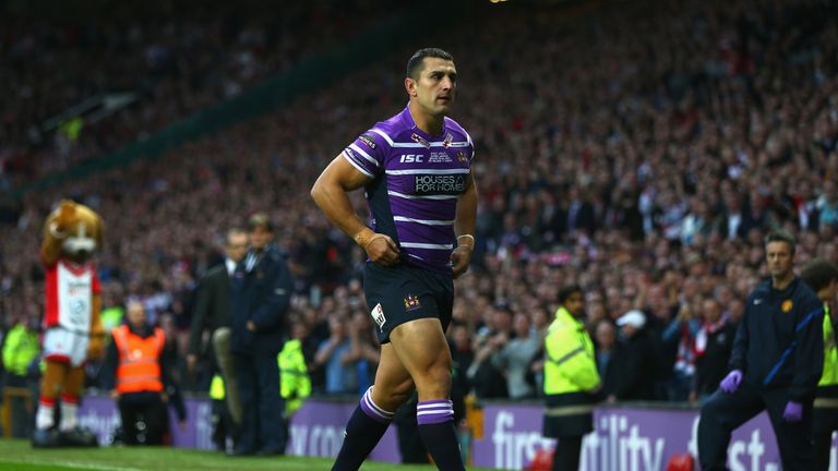 MANCHESTER, ENGLAND - OCTOBER 11: Ben Flower of Wigan walks from the pitch after receiving a red card during the First Utility Super League Grand Final mat