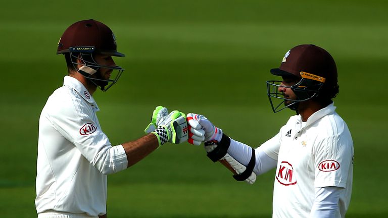 LONDON, ENGLAND - SEPTEMBER 13: Surrey's Ben Foakes (L) and Kumar Sangakkara (R) chat in the middle as they put on a partnership of 258 during day two of t