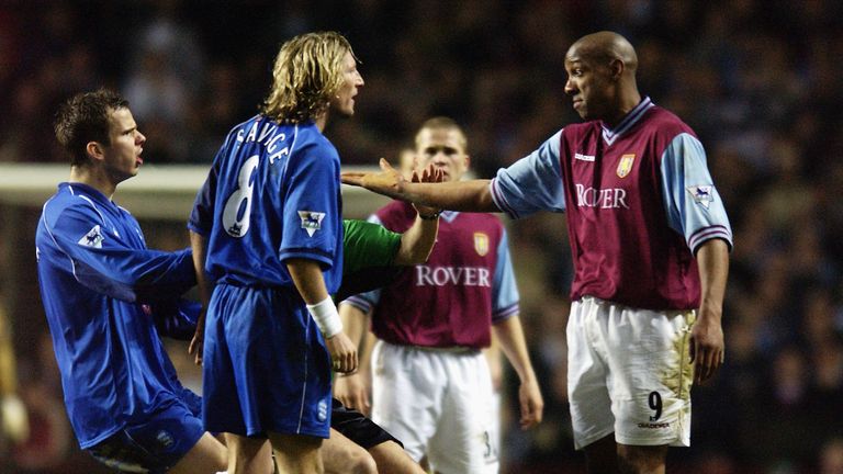BIRMINGHAM - MARCH 3:  Robbie Savage of Birmingham City argues with Dion Dublin of Aston Villa during the FA Barclaycard Premiership match held on March 3,