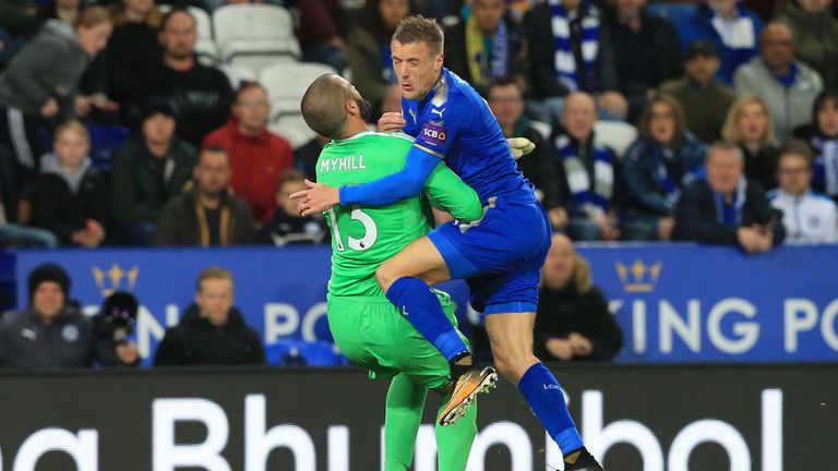 Jamie Vardy (R) clashes with Boaz Myhill
