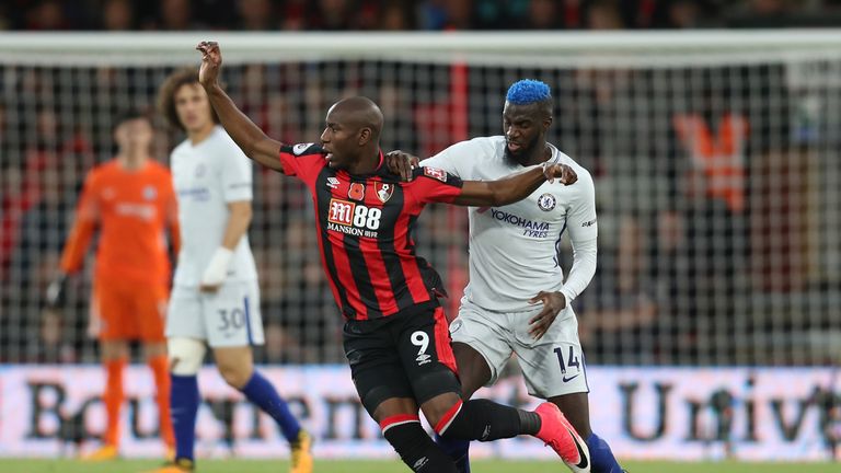 BOURNEMOUTH, ENGLAND - OCTOBER 28: Tiemoue Bakayoko of Chelsea fouls Benik Afobe of AFC Bournemouth during the Premier League match between AFC Bournemouth