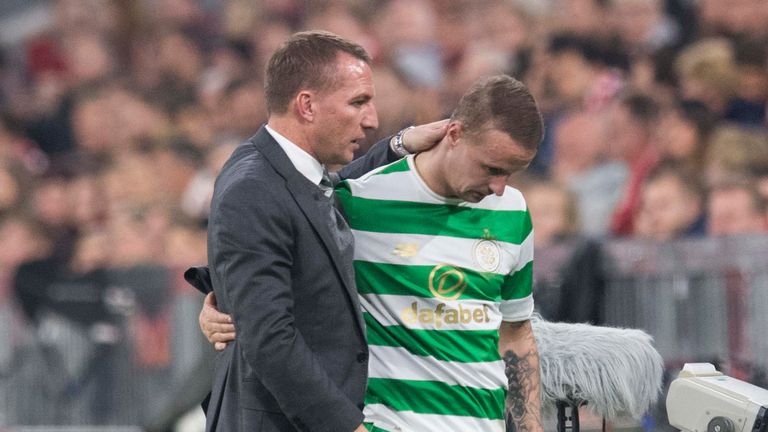 Brendan Rodgers embraces Leigh Griffiths as he substituted in Munich