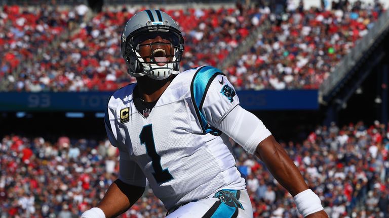 FOXBORO, MA - OCTOBER 01:  Cam Newton #1 of the Carolina Panthers reacts after throwing a touchdown pass to Devin Funchess #17 (not pictured) during the th