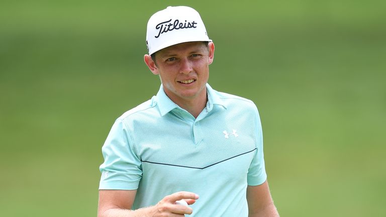 Cameron Smith of Australia reacts after making a birdie putt on the 14th hole during the first round of the 2017 CIMB Classic golf tournament in Kuala Lump