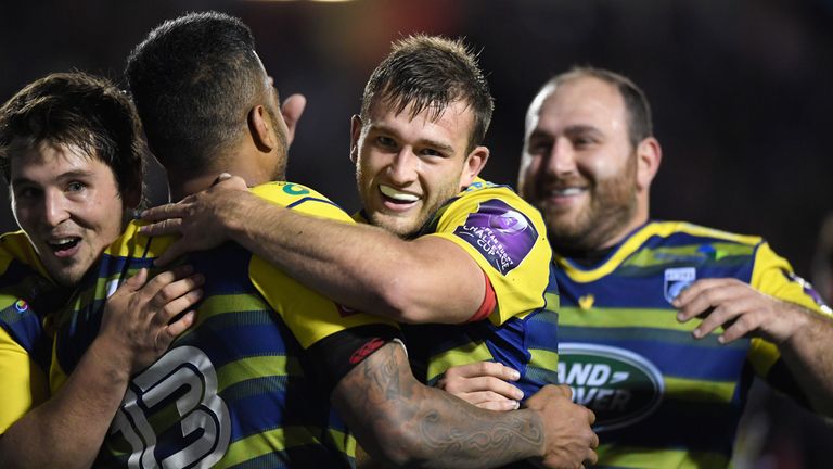 CARDIFF, WALES - OCTOBER 13:  Blues centre Rey Lee-Lo (2nd l) is congratulated by team mates after scoring his sides fourth try of the evening during the E