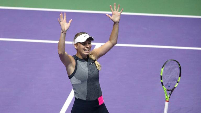 SINGAPORE - OCTOBER 29:  Caroline Wozniacki of Denmark celebrates victory in the Singles Final against Venus Williams of the United States during day 8 of 