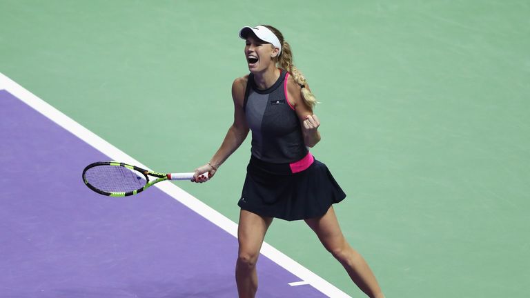 SINGAPORE - OCTOBER 28:  Caroline Wozniacki of Denmark celebrates victory in her singles semi final match against Karolina Pliskova of Czech Republic durin