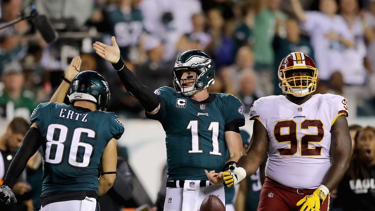 PHILADELPHIA, PA - OCTOBER 23:  Quarterback  Carson Wentz #11 of the Philadelphia Eagles celebrates a first down against the Washington Redskins during the