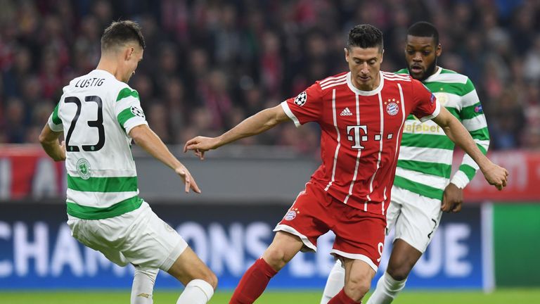 (L-R) Celtic's Swedish defender Mikael Lustig, Bayern Munich's Polish striker Robert Lewandowski and Celtic's French midfielder Olivier Ntcham vie for the 