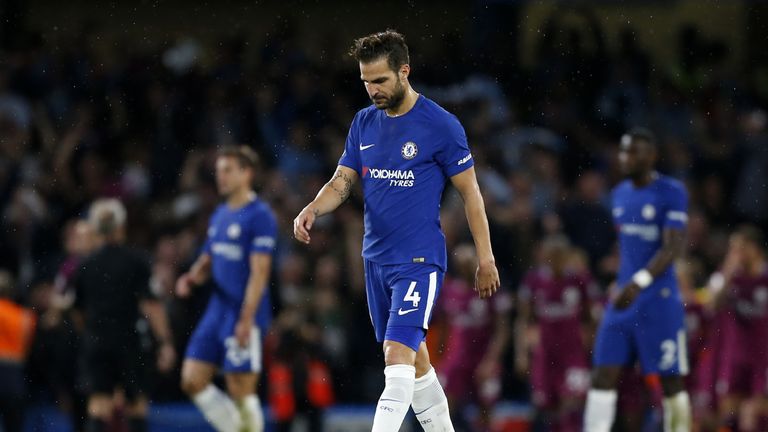 Chelsea's Spanish midfielder Cesc Fabregas reacts after they concede the first goal during the English Premier League football match between Chelsea and Ma