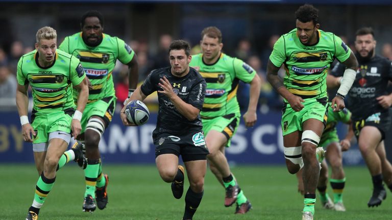 Charlie Cassang of Clermont Auvergen breaks clear to score their third try