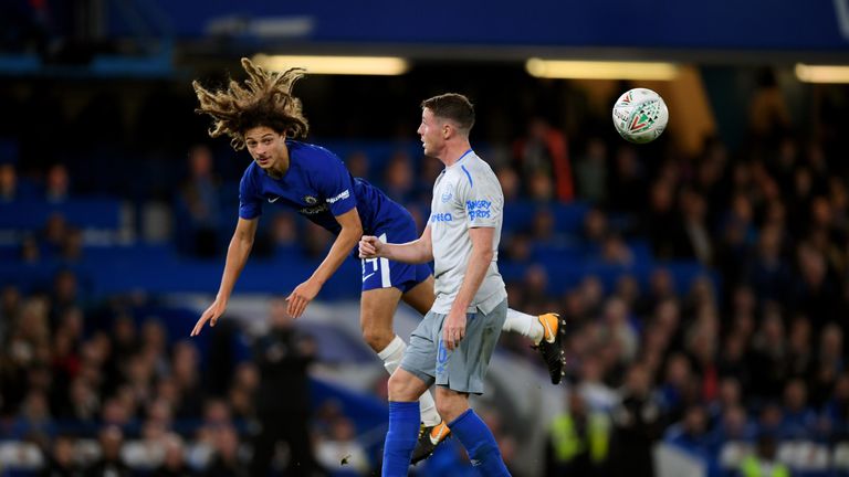 Ethan Ampadu wins the ball from James McCarthy during the Carabao Cup match