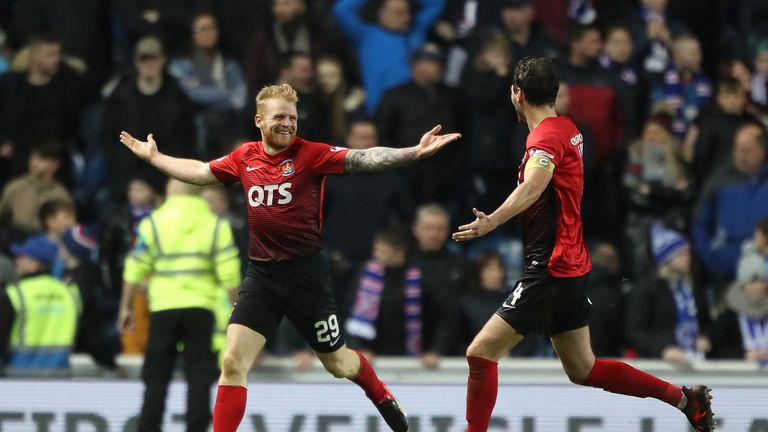 Kilmarnock's Christopher Burke (left) celebrates scoring his side's first goal of the game during the Scottish Premiership match at Ibrox, Glasgow.