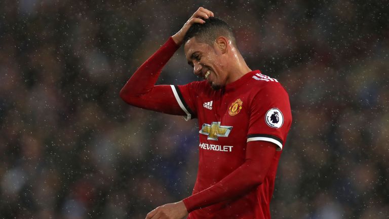 Manchester United's English defender Chris Smalling gestures during the English Premier League football match between Huddersfield Town and Manchester Unit