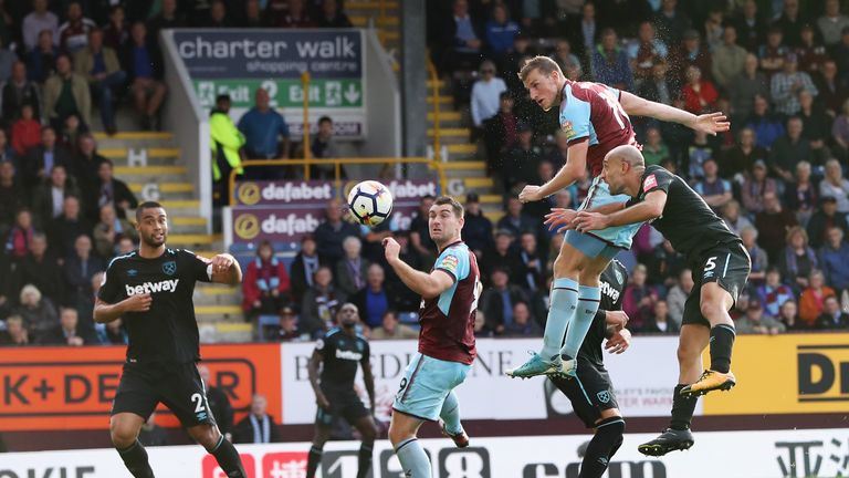 Chris Wood of Burnley scores his sides first goal during the Premier League match between Burnley and West Ham United at Turf Moor