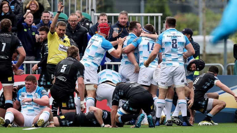 Leinster's Cian Healy is congratulated by his teammates after scoring a try