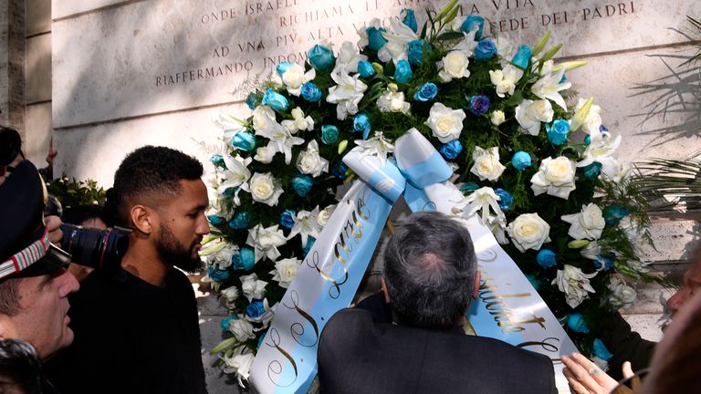 Lazio's President Claudio Lotito lays a wreath at at the synagogue in Rome. 