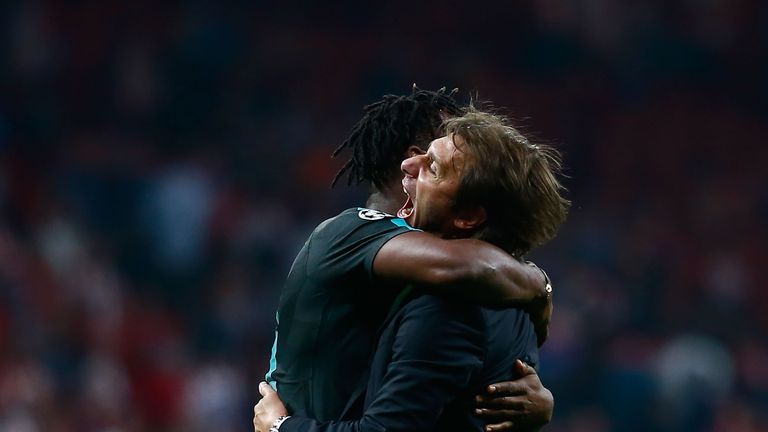 MADRID, SPAIN - SEPTEMBER 27:  Michy Batshuayi of Chelsea and Antonio Conte, Manager of Chelsea celebrate victory during the UEFA Champions League group C 
