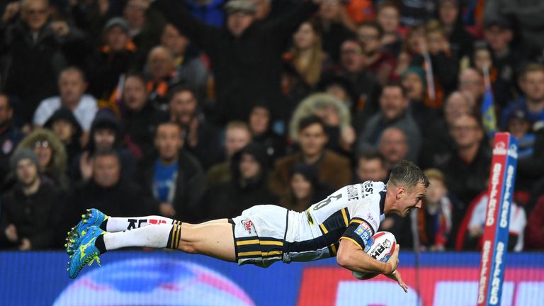   Danny McGuire dives over to score his first try