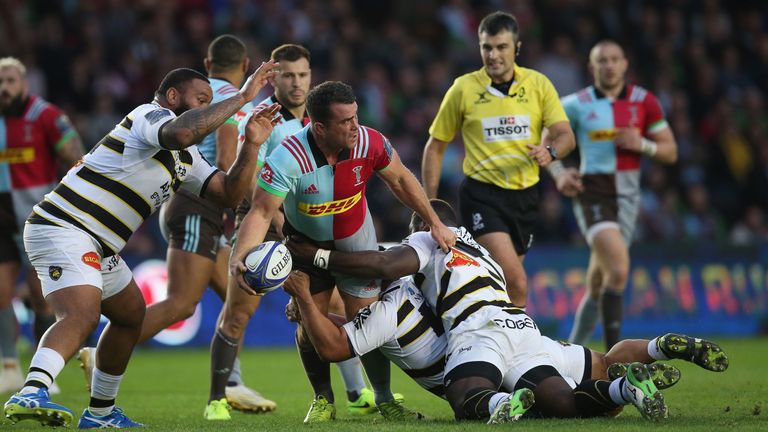 Dave Ward of Harlequins takes on the La Rochelle defence 