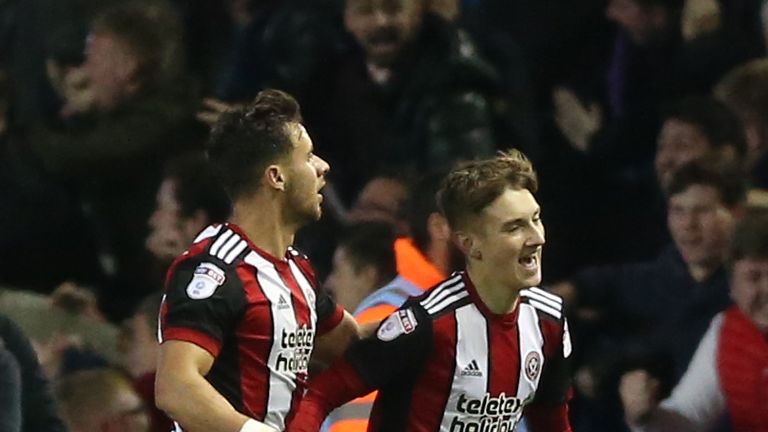 Sheffield United's David Brooks (right) celebrates scoring the winner at Elland Road