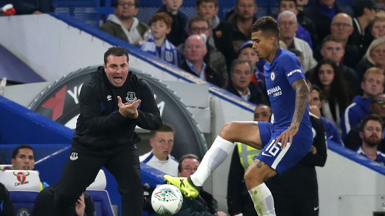 Everton's interim manager David Unsworth cheers on his team at Stamford Bridge