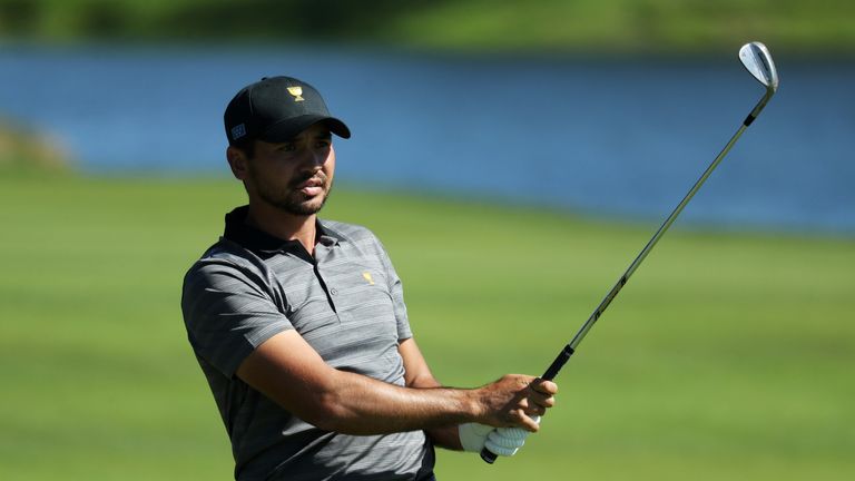 JERSEY CITY, NJ - OCTOBER 01:  Jason Day of Australia and the International Team plays a shot on the first hole during Sunday singles matches of the Presid