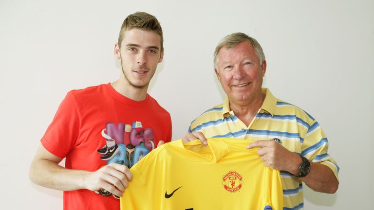 David De Gea and Manager Sir Alex Ferguson pose during David De Gea's signing at the Carrington Training Ground on June 28, 2011