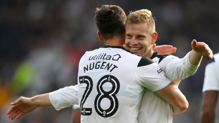 Derby County's David Nugent celebrates scoring his side's second goal of the game against Nottingham Forest with team-mate Matej Vydra 