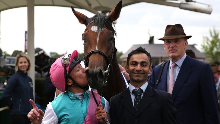 Frankie Dettori Kisses Enable after winning The Darley Yorkshire Oaks during Darley Yorkshire Oaks and Ladies Day of the Yorkshire Ebor Festival at York Ra