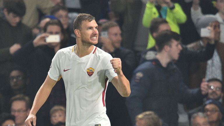 Roma's Bosnian striker Edin Dzeko celebrates after scoring his second goal during a UEFA Champions league group stage football match between Chelsea and Ro