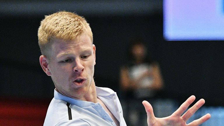 Great Britain's Kyle Edmund returns the ball to Spain's David Ferrer during their men's singles tennis match at the ATP tennis tournament in Vienna on Octo