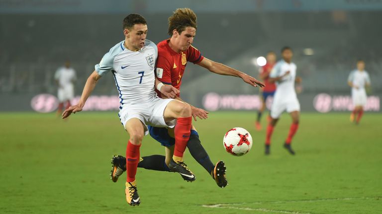 Philip Foden of England U17s and Juan Miranda of Spain U17s in action during the FIFA Under-17 World Cup India 2017 Final