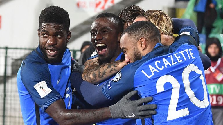 France's midfielder Blaise Matuidi (C) celebrates with teammates after scoring his team's first goal during the FIFA World Cup 2018 qualifying football mat