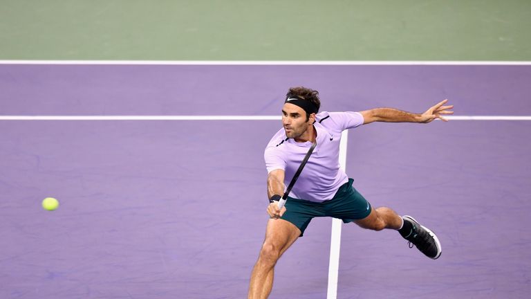 SHANGHAI, CHINA - OCTOBER 15:  Roger Federer of Switzerland in action against Rafael Nadal of Spain during Day 8 of Men's Single Final on October 15, 2017 