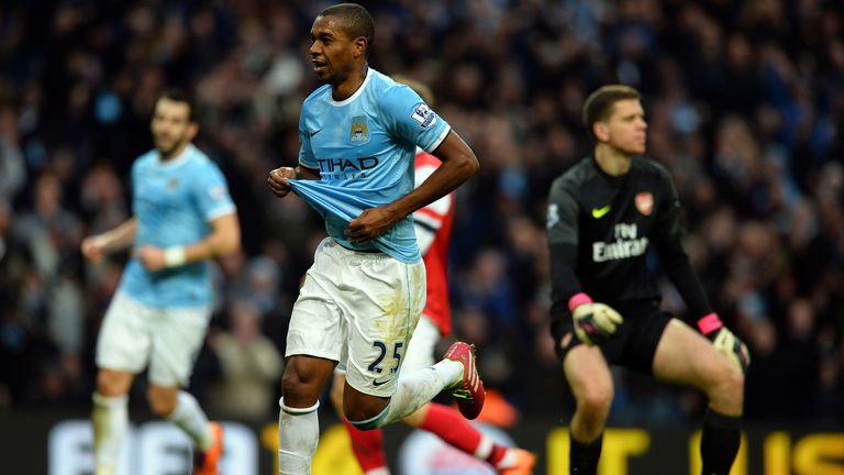 Manchester City's Brazilian midfielder Fernandinho (C) celebrates scoring his second goal during the English Premier League football match between Manchest