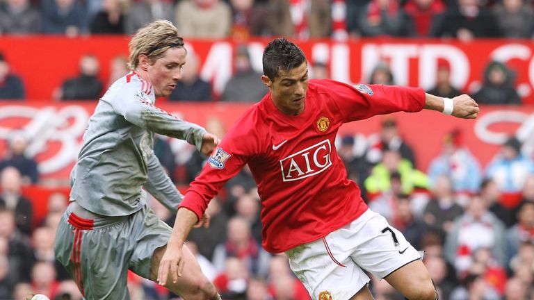 Cristiano Ronaldo and Fernando Torres in Liverpool's 4-1 victory against Manchester United at Old Trafford