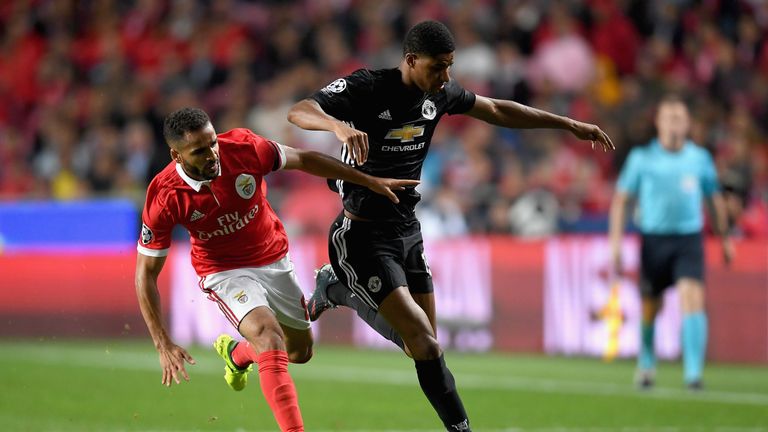 Marcus Rashford takes on Douglas in the first half