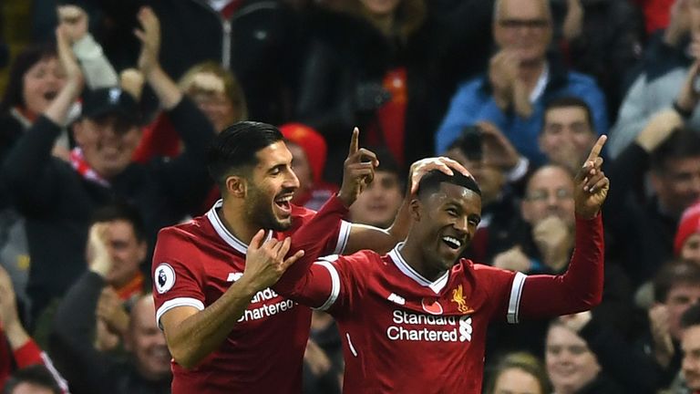 Georginio Wijnaldum of Liverpool celebrates scoring his side's third goal with Emre Can of Liverpool during the Pre