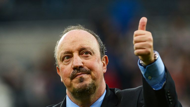 Rafa Benitez gives the thumbs up to Newcastle fans during the Premier League match Liverpool