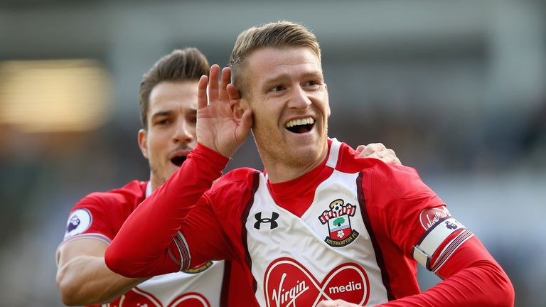 Steven Davis of Southampton celebrates as he scores their first goal with Cedric Soares of Southampton during the Premier League match at Brighton