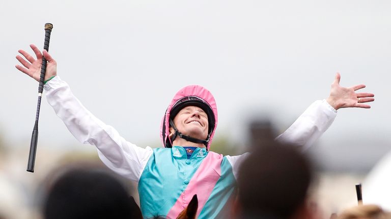 Frankie Dettori celebrates after riding Enable to win the Qatar Prix de l'Arc de Triomphe