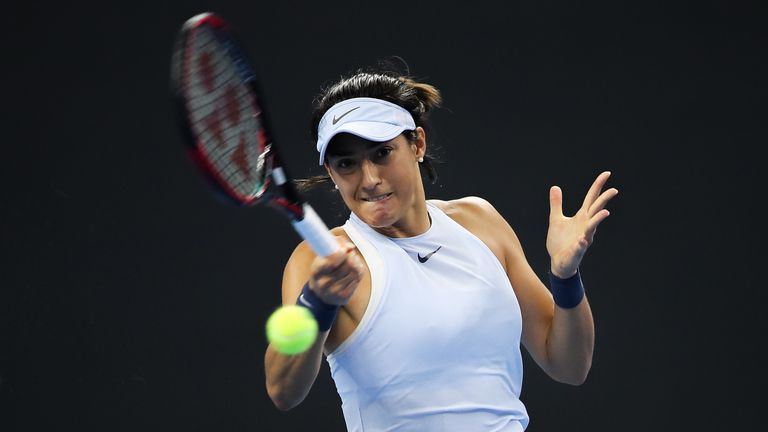 BEIJING, CHINA - OCTOBER 08:  Caroline Garcia of France returns a shot during the Women's Singles finals match against Simona Halep of Romania on day nine 