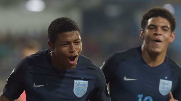 Rhian Brewster (L) of England celebrates with teammate Callum Hudson-Odoi after scoring the second goal during the quarterfinal football match between USA 