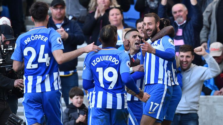 Glenn Murray (R) celebrates with team-mates after scoring Brighton's first goal during the English Premier League football match v Southampton