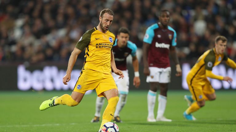 LONDON, ENGLAND - OCTOBER 20:  Glenn Murray of Brighton and Hove Albion scores their third goal from the penalty spot during the Premier League match betwe
