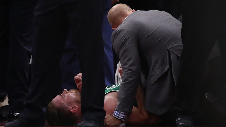 CLEVELAND, OH - OCTOBER 17:   Gordon Hayward #20 of the Boston Celtics is sits on the floor after being injured while playing the Cleveland Cavaliers at Qu